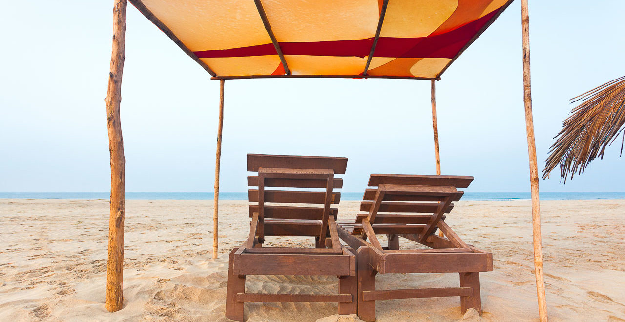 chairs on the beach in Goa, India