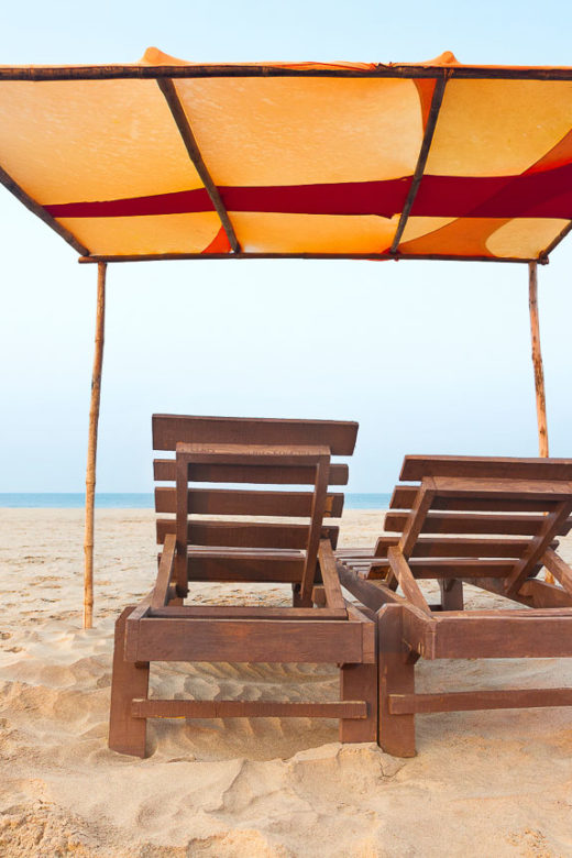 chairs on the beach in Goa, India