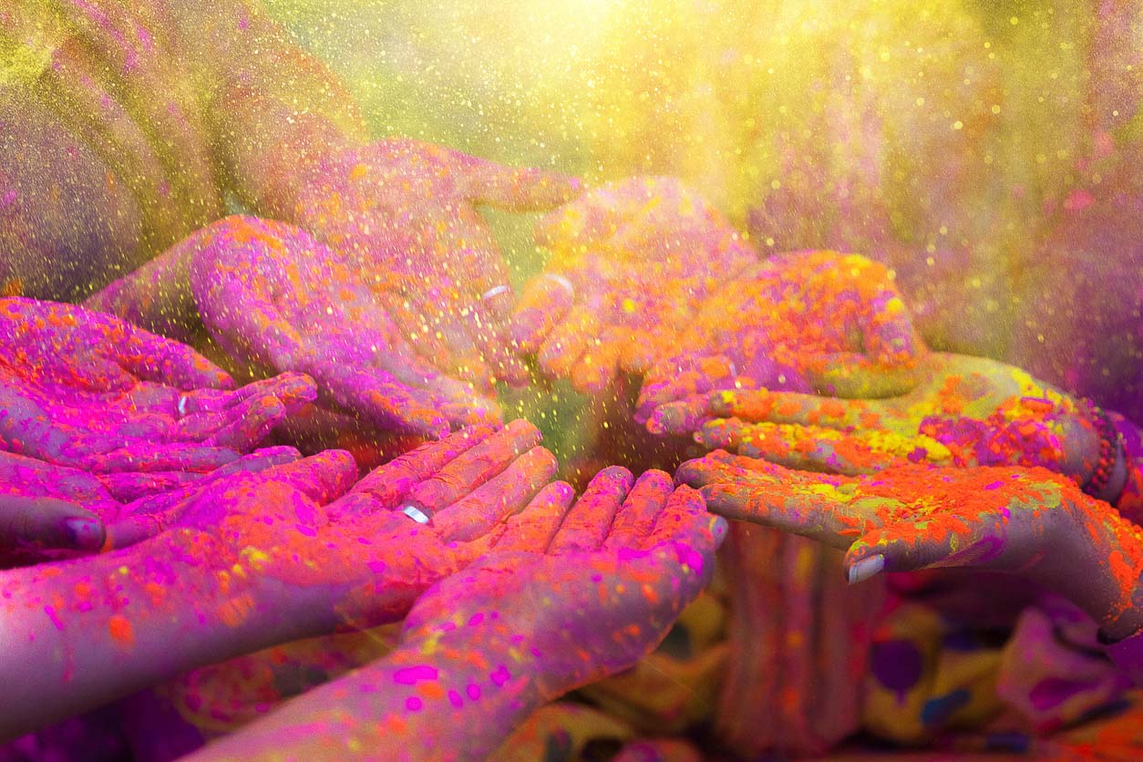 Holi tour of India colourful hands