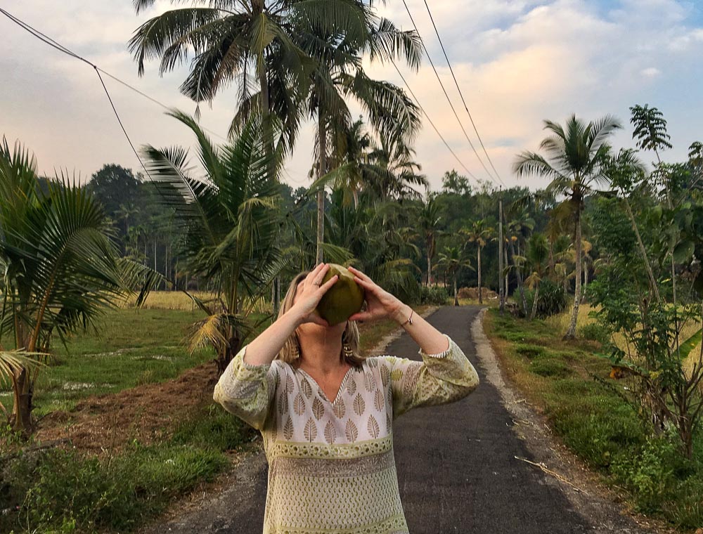 Mariellen Ward drinking coconut in Kerala
