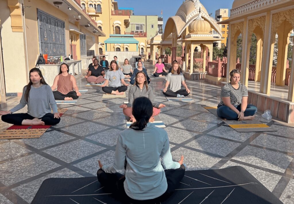 students learning Yoga during Study Abroad in India program